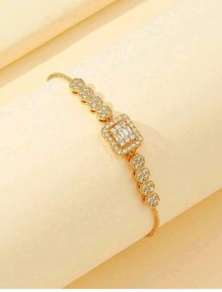 A luxurious, one-piece gemstone-encrusted bracelet