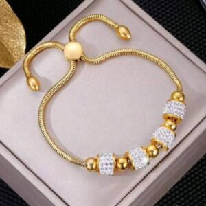 18K gold-toned adjustable snake chain bracelet with crystal-paved cylindrical beads and plain gold spherical beads