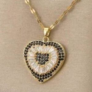 Gold-plated heart pendant necklace featuring a design of black and white cubic zirconia