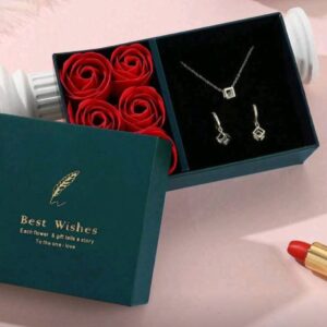 Valentine’s Day gift box containing soap flowers and a jewelry set consisting of a necklace and earrings