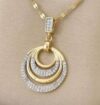 Yellow gold necklace featuring a diamond-encrusted circular pendant