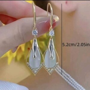 Exquisite and elegant drop earrings adorned with water stones and sparkling Synthetic Zirconia