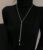 1pc Fashionable Ins Style Stainless Steel Round Bead Faux Pearl Tassel Pull-Out Adjustable Long Necklace